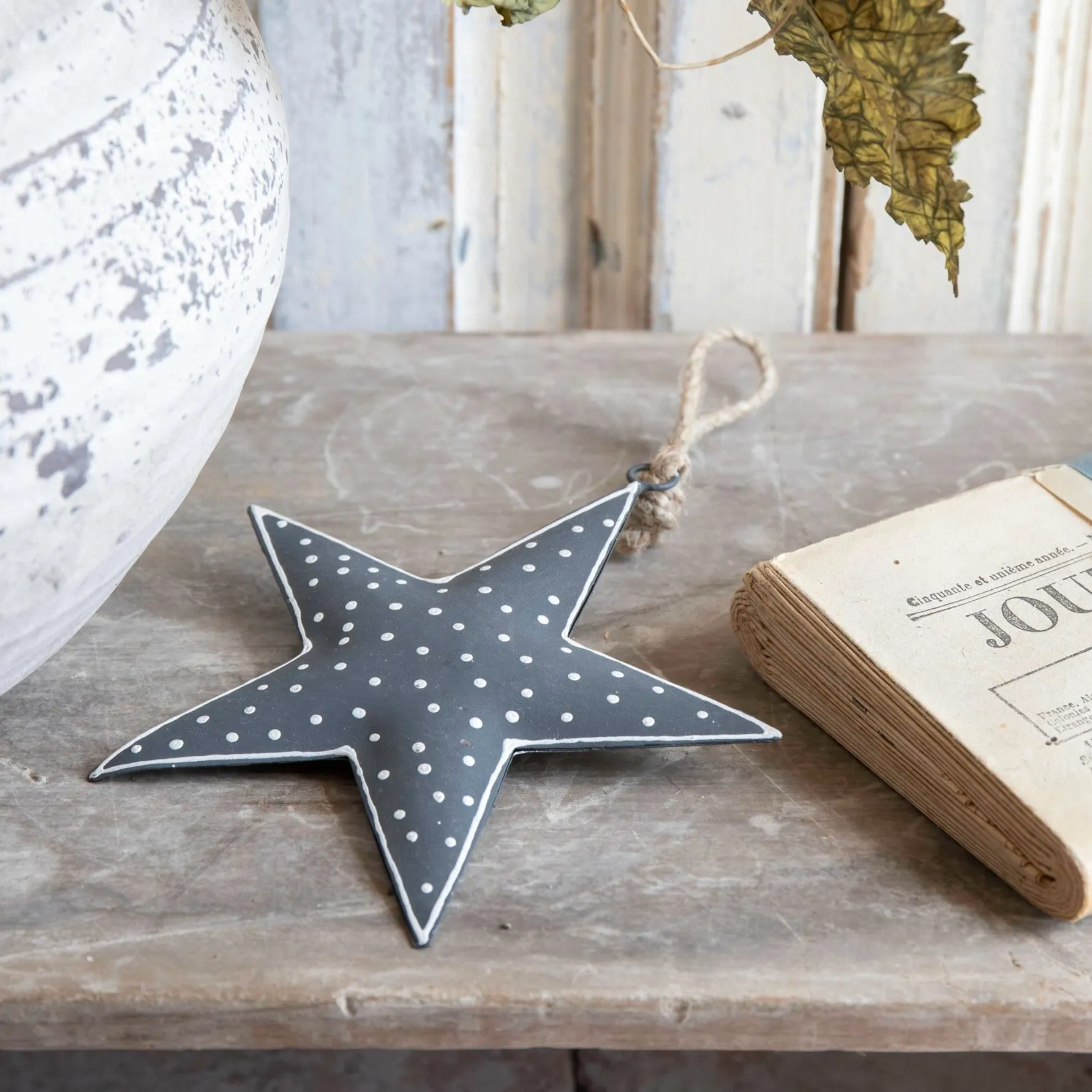 Hanging grey spotty star