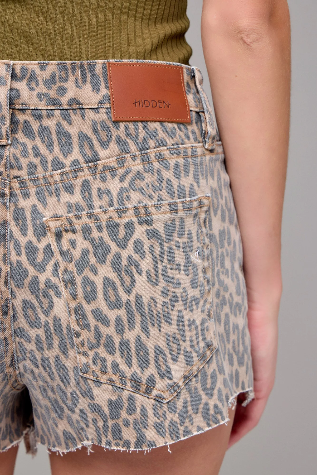 Hidden Jeans Cheetah Print Jagged Hem Shorts  3" Inseam